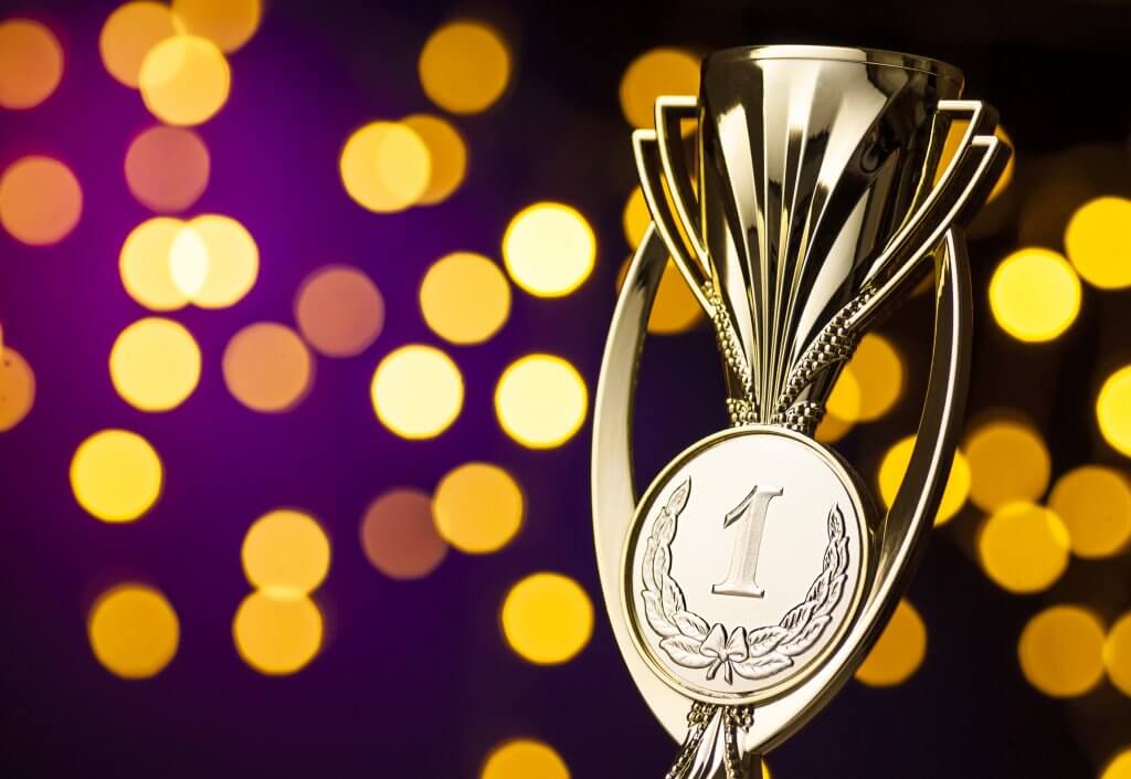 championship-winners-award-with-a-gold-trophy-XP4RTSD-scaled