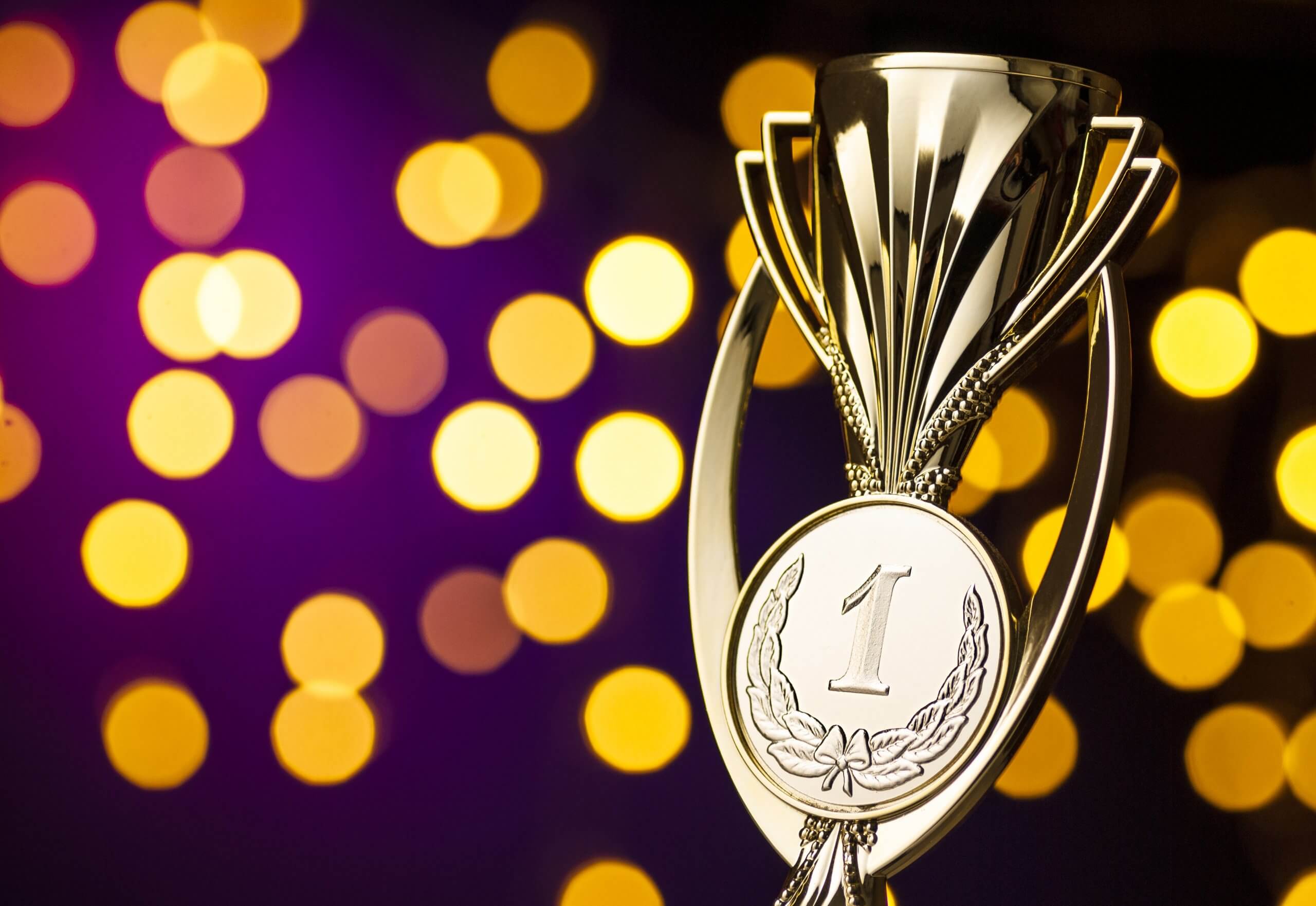 championship-winners-award-with-a-gold-trophy-XP4RTSD-scaled