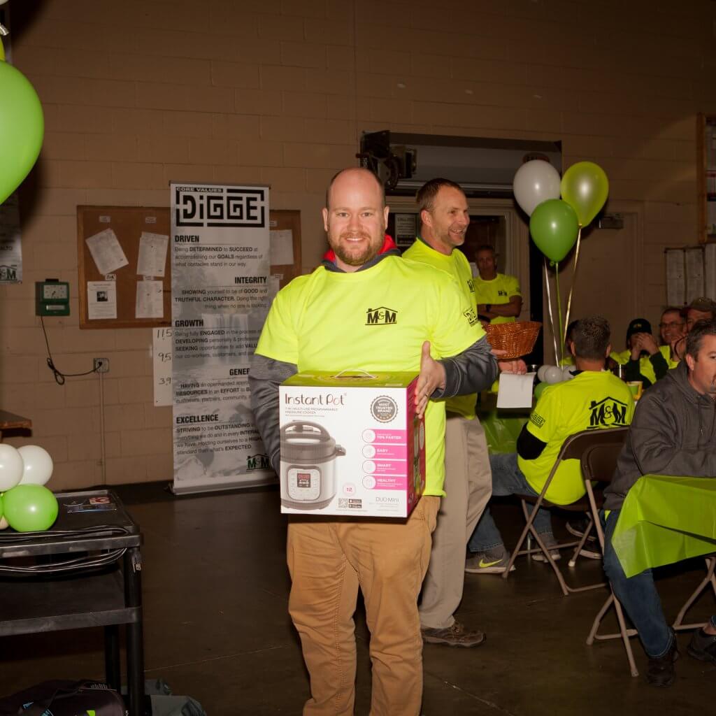 man holding the rice cooker