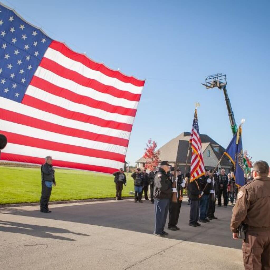 people singing national anthem