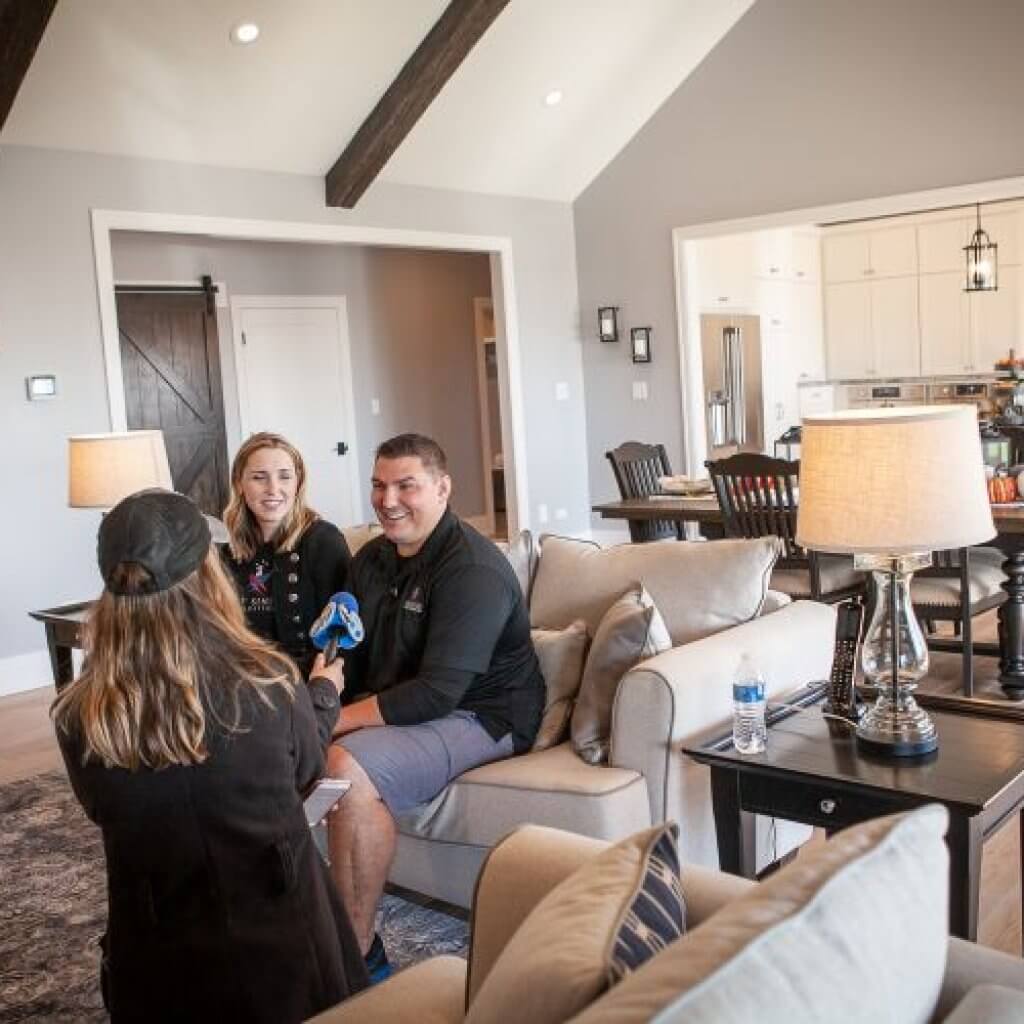 reporter interviewing couple