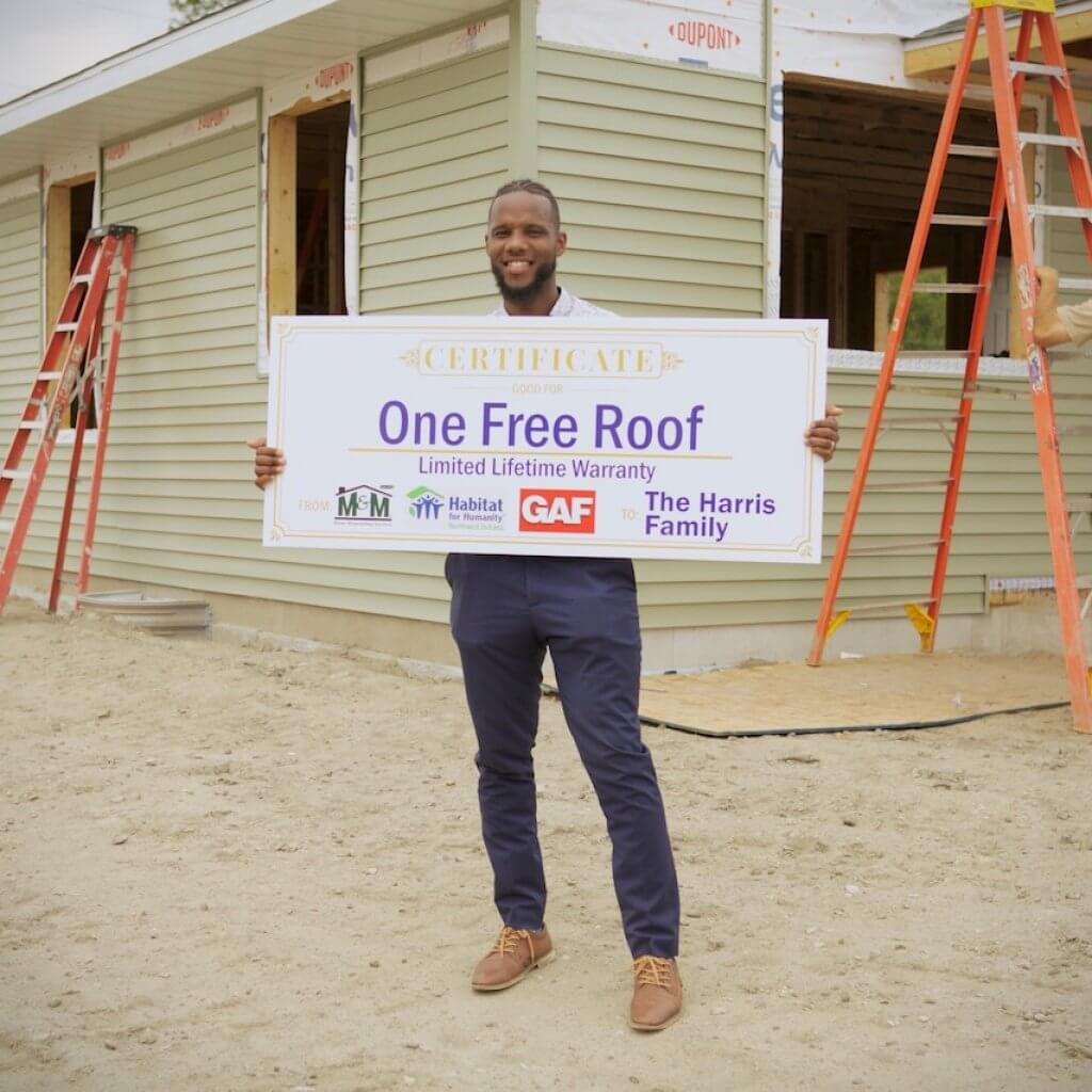 man holding a signage