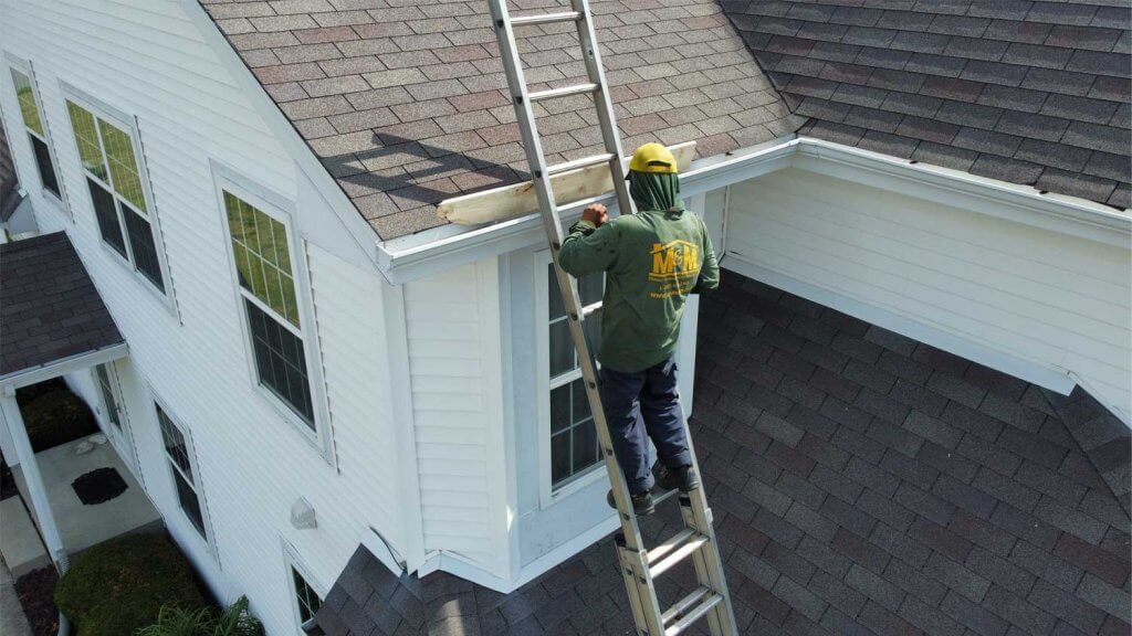 Installer-on-ladder-1