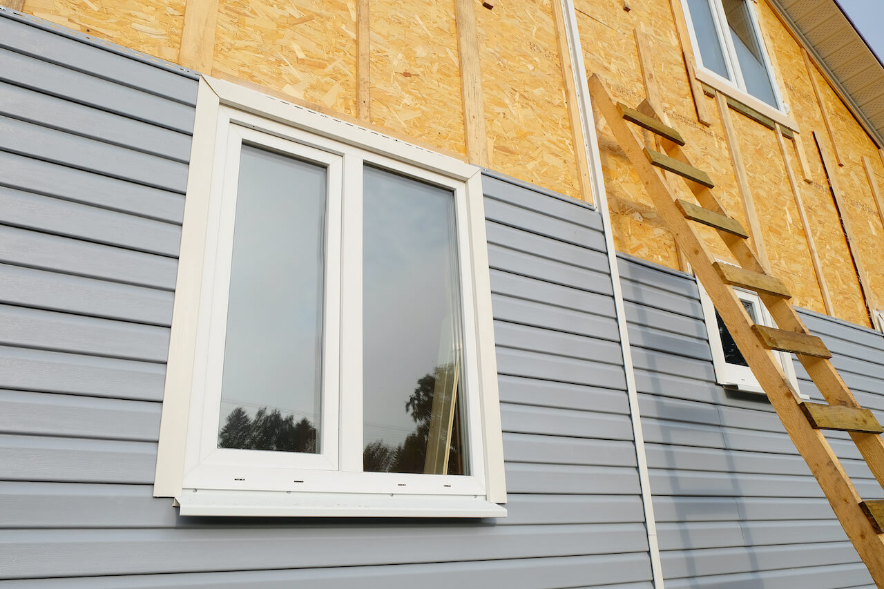 siding covering the wall of a house under construction